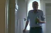 Charles Bukowski standing in the bathroom of his childhood home in Mid-City Los Angeles